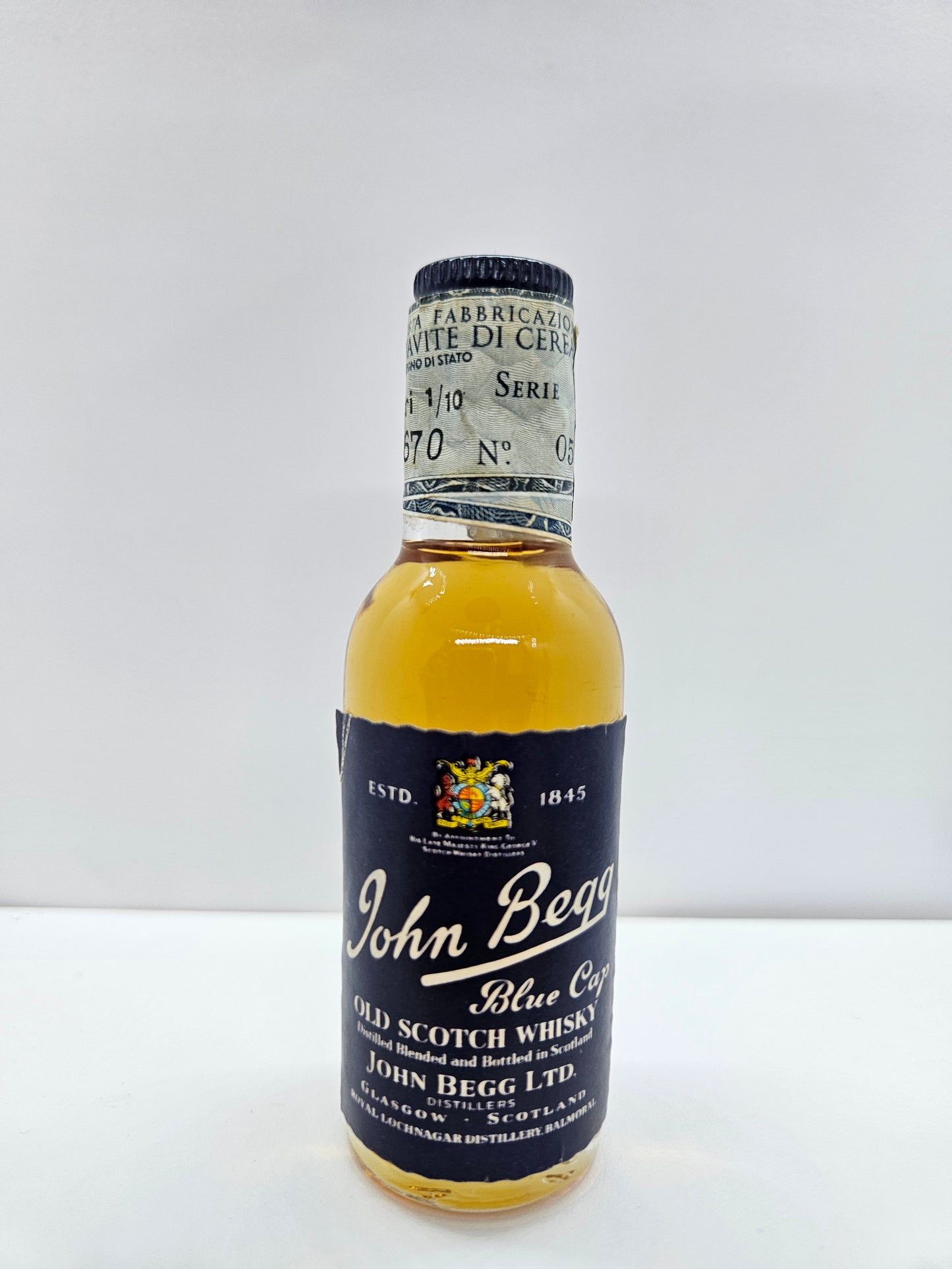 John Begg blue caps scotch whisky